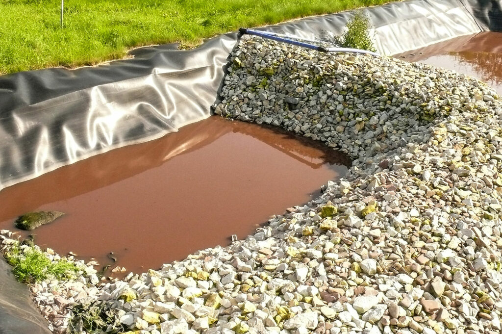 Regenrückhaltebecken: Nachweis des hydraulischen Lastfalls bei Überflutungsbeginn